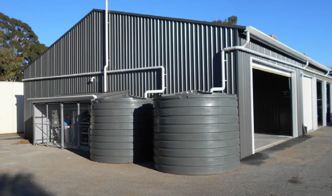 Industrial wash bay with large water tanks